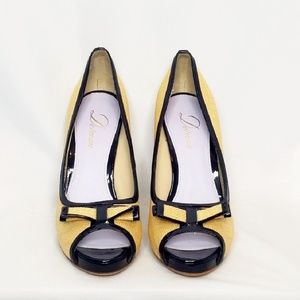 Delman Texture and Patent Leather Pumps With Bows